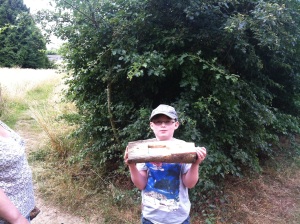 A cunning hide indeed. Sam is pictured holding a log that has been hollowed out to enable the cache container to be place inside.